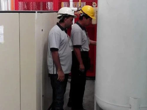 Industrial-grade 2000L air receiver tank with JKKP and ASME certification in operation within a compressed air system in Malaysia.